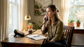 Counselor on phone in health center office