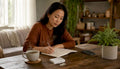 Woman journaling quit smoking plan indoors