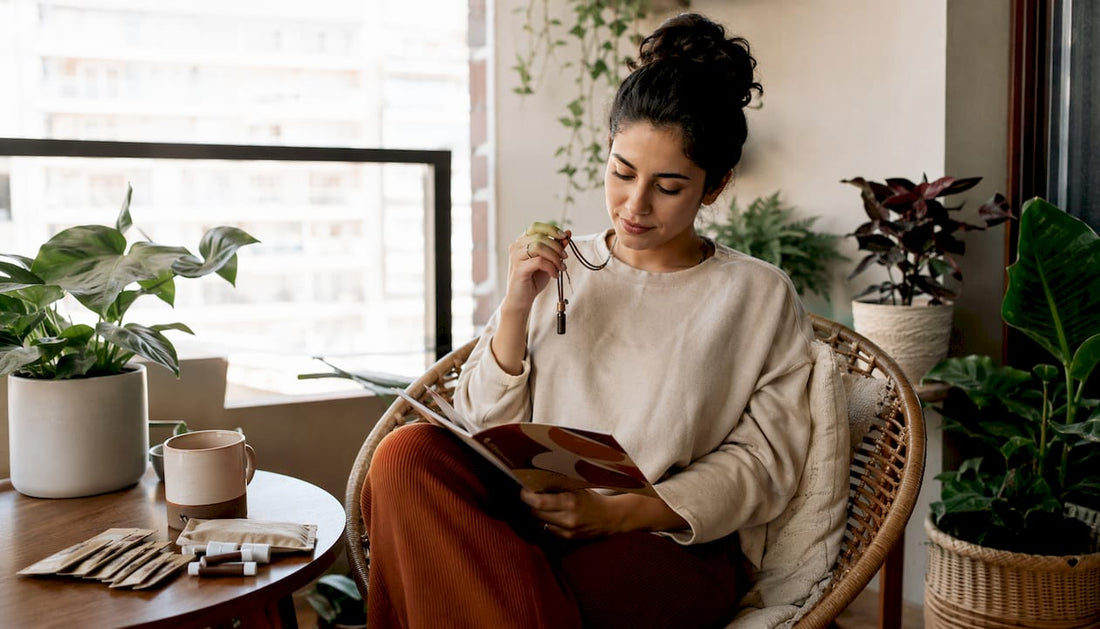 Woman using nicotine-free quit tools at home table