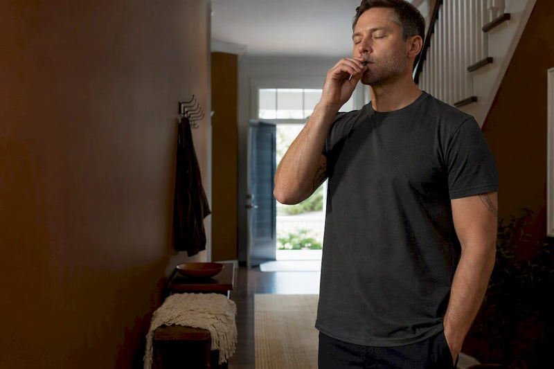 Person using a breathing tool during craving