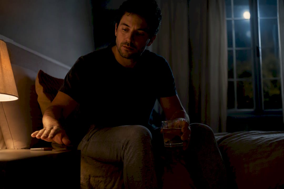 Person resisting a nighttime cigarette craving
