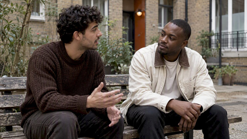 Quit partners sharing a focused outdoor check-in