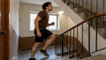 Adult climbing apartment stairs for exercise