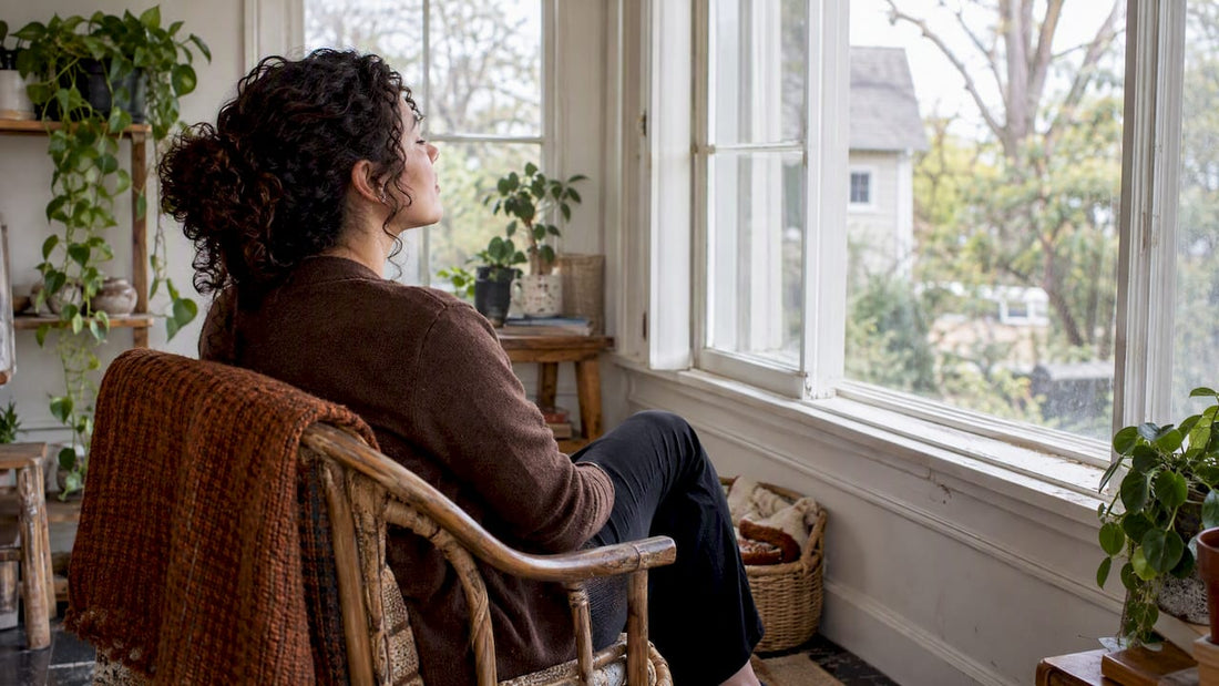 Woman practicing a slow breath at home